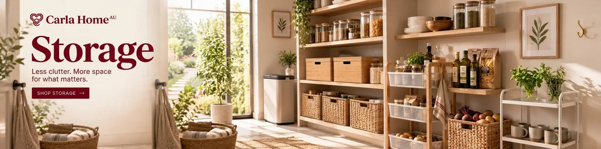 Carla Home Storage promotional scene showing a styled home interior with wooden shelving, baskets, jars, plants, and storage bins in a bright room with large windows.